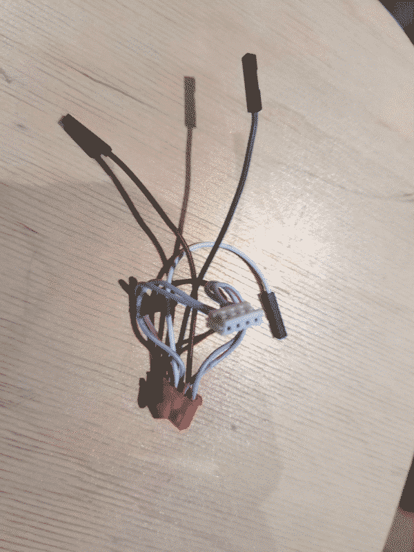 image of cable that I modded, it has two connectors either side but on one side it also has some jumper pins coming off