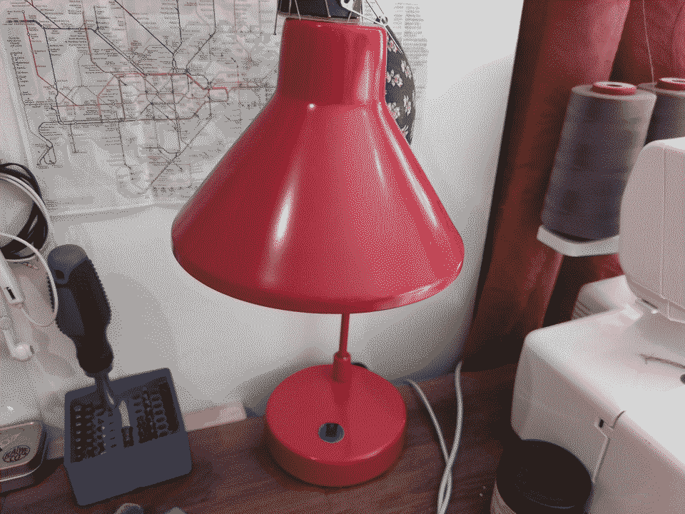 image of shelly device with mains power cable pluged in. The device is enclosed in a black 3d printed case.