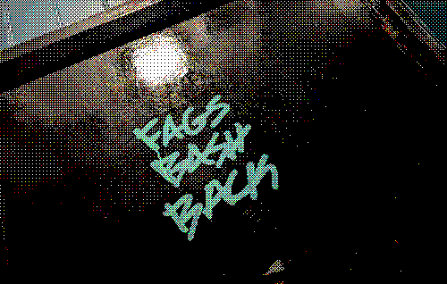 Grafiti on the door of a bathroom saying fags bash back.
